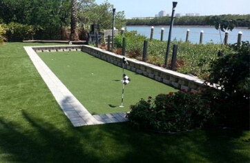 this small golf green would fit well with a bocce court