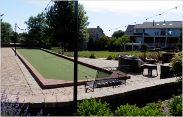 a narrow area at the end of a courtyard is ideal for a bocce court