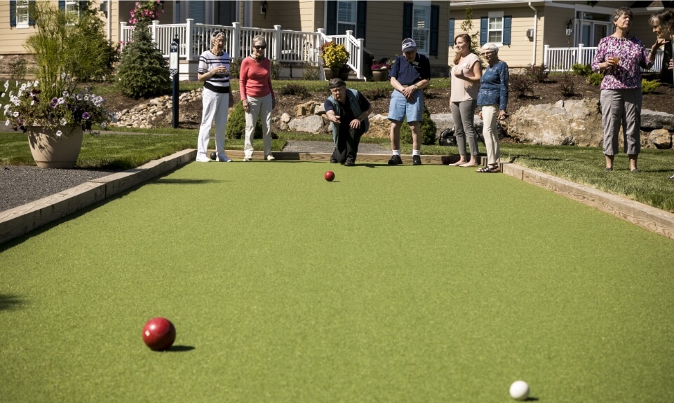 a bocce league playing on a synthetic turf bocce court