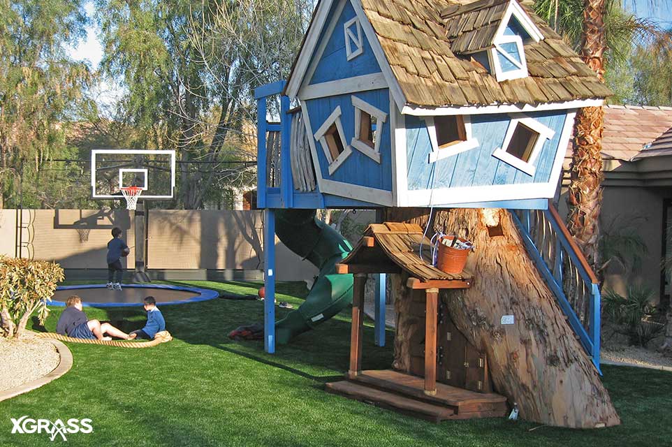 Backyard playground with an in-ground trampoline