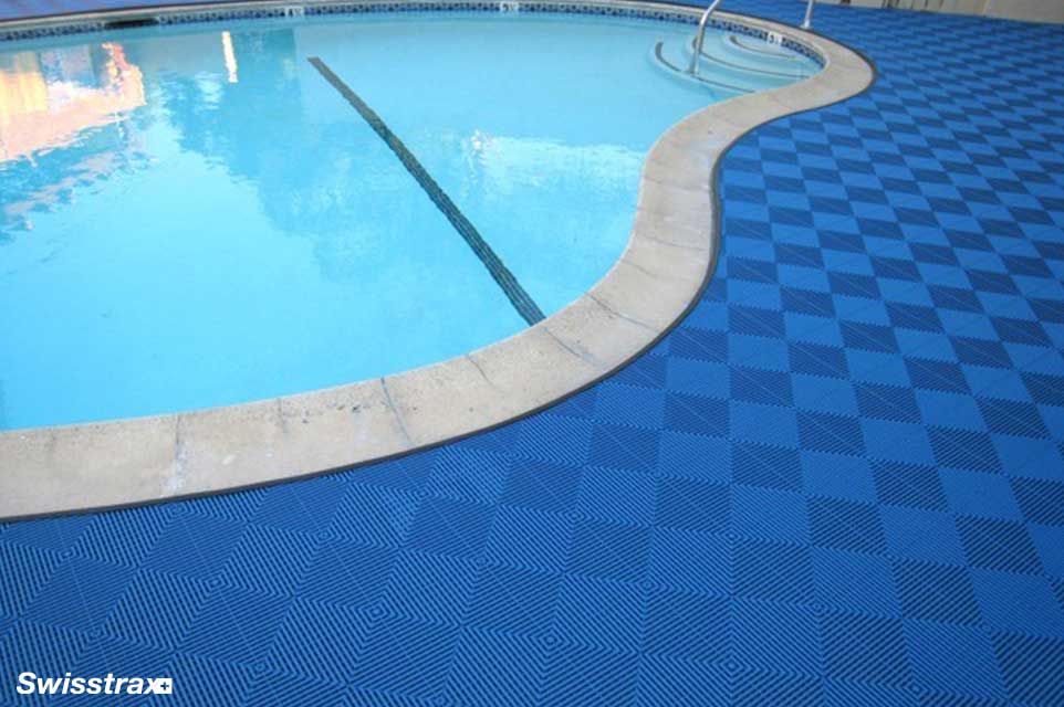 Pool deck surfacing featuring slip resistant floor tiles from Swisstrax