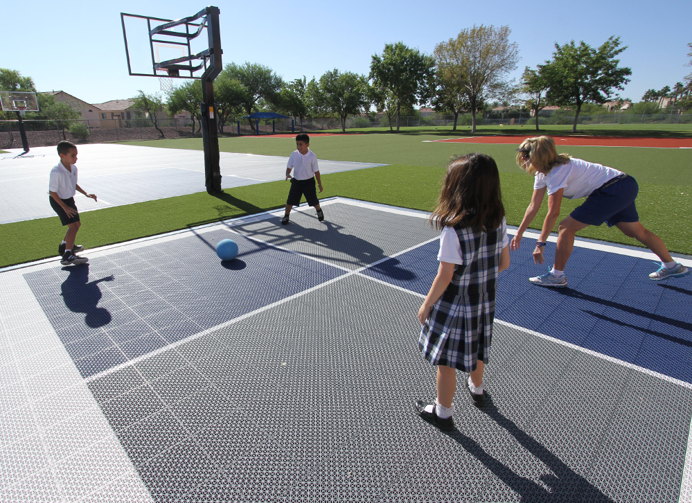 Bring Your Space Alive Four Square Game Courts Surrounded by Artificial Turf