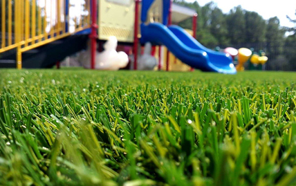 Close up of turf strands on a playground
